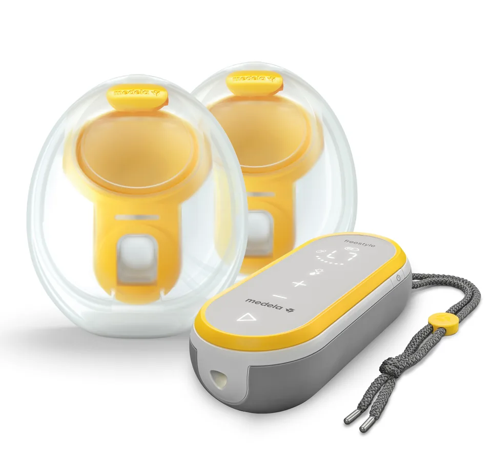Medela Freestyle Hands-free motor and two collection cups, with tubing omitted from the product shot